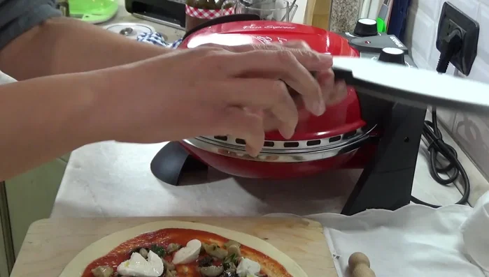 Infornare nel forno elettrico con pietra refrattaria, spruzzando un goccio d'olio (152.89).