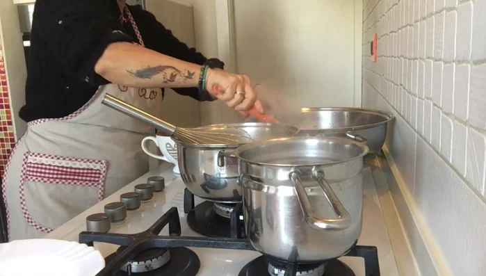 Unire le verdure alla polenta cotta. [535.42]