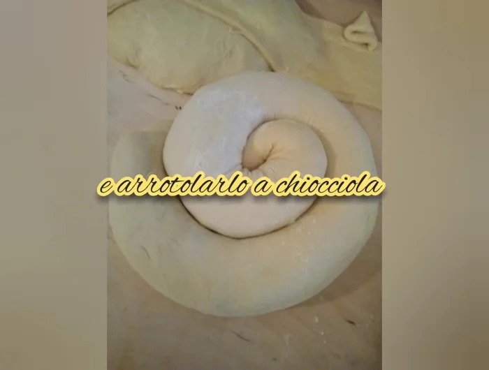 Dare alla gubana la forma a chiocciola.
